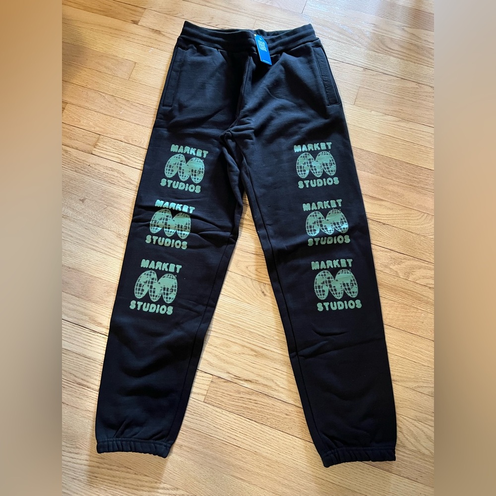 Market Studios Sweat Pants. Size MD.Black and Green Joggers with Graphic Prints